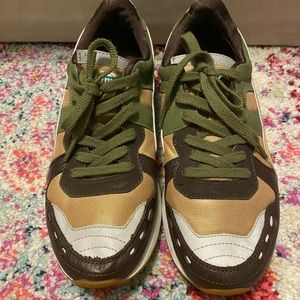 Brown gold and green athletic Puma sneakers